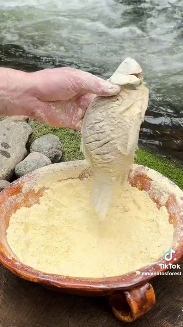 A delicious fish with rice garnish and asian sauce